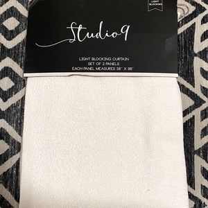 Studio 9 Bone Color Light blocking curtain set up two panels 38” x 96”